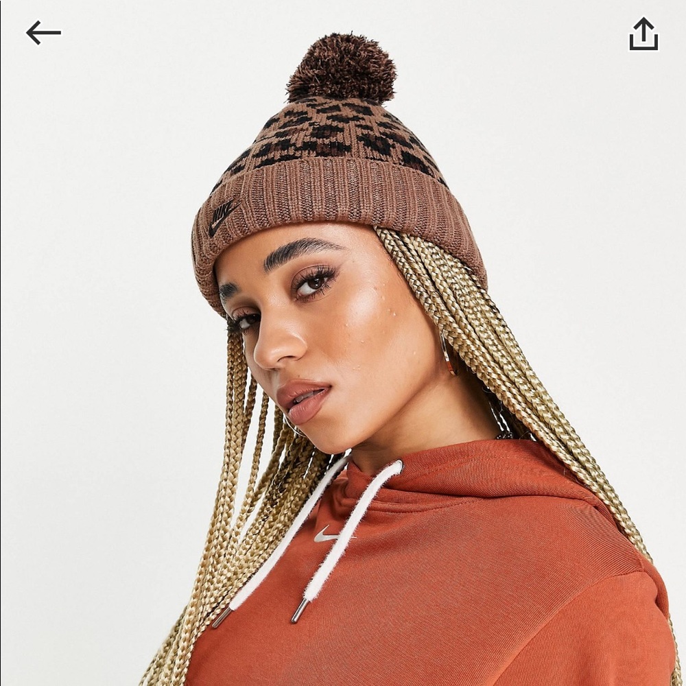 Nike leopard print pom pom cuffed beanie hat in brown
